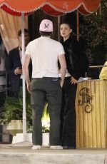 NICOLA PELTZ and Brooklyn Beckham Leavies The Bird Streets Club in West Hollywood 11/21/2023