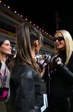 NINA DOBREV and PARIS HILTON at F1 Grand Prix of Las Vegas 11/18/2023