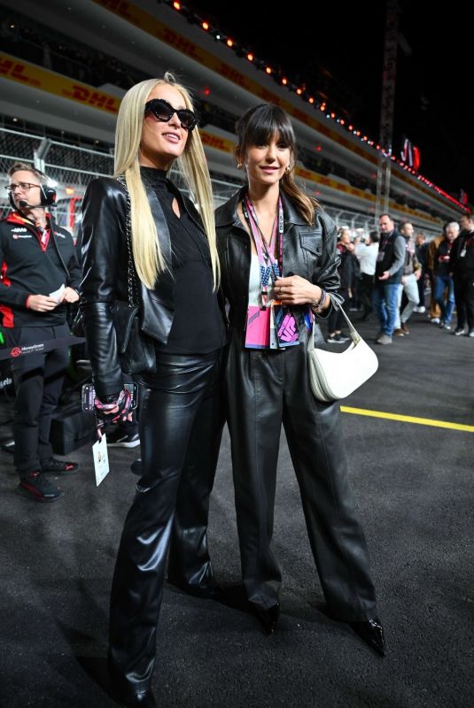 NINA DOBREV and PARIS HILTON at F1 Grand Prix of Las Vegas 11/18/2023