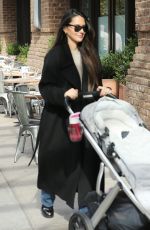 OLIVIA MUNN Out with Her Uppababy Stroller in New York 11/04/2023