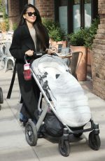 OLIVIA MUNN Out with Her Uppababy Stroller in New York 11/04/2023