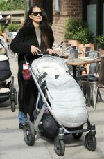 OLIVIA MUNN Out with Her Uppababy Stroller in New York 11/04/2023