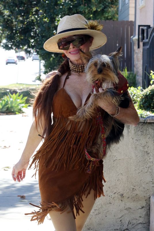 PHOEBE PRICE Out with Her Dog in Los Angeles 11/19/2023