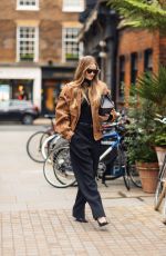 ROSIE HUNTINGTON-WHITELEY in a Saint Laurent and Phoebe Philo Outfit Out in London 11/21/2023