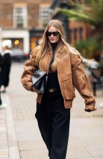 ROSIE HUNTINGTON-WHITELEY in a Saint Laurent and Phoebe Philo Outfit Out in London 11/21/2023