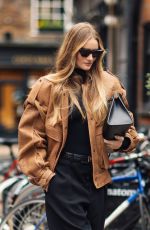 ROSIE HUNTINGTON-WHITELEY in a Saint Laurent and Phoebe Philo Outfit Out in London 11/21/2023