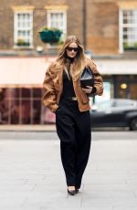 ROSIE HUNTINGTON-WHITELEY in a Saint Laurent and Phoebe Philo Outfit Out in London 11/21/2023