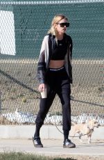 STELLA MAXWELL Out with Her Dog in Los Angeles 11/26/2023