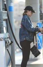 SUKI WATERHOUSE at a Gas Station in Los Angeles 11/17/2023