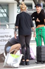 VOGUE WILLIAMS and JOANNE MCNALLY at Perth Airport 11/12/2023