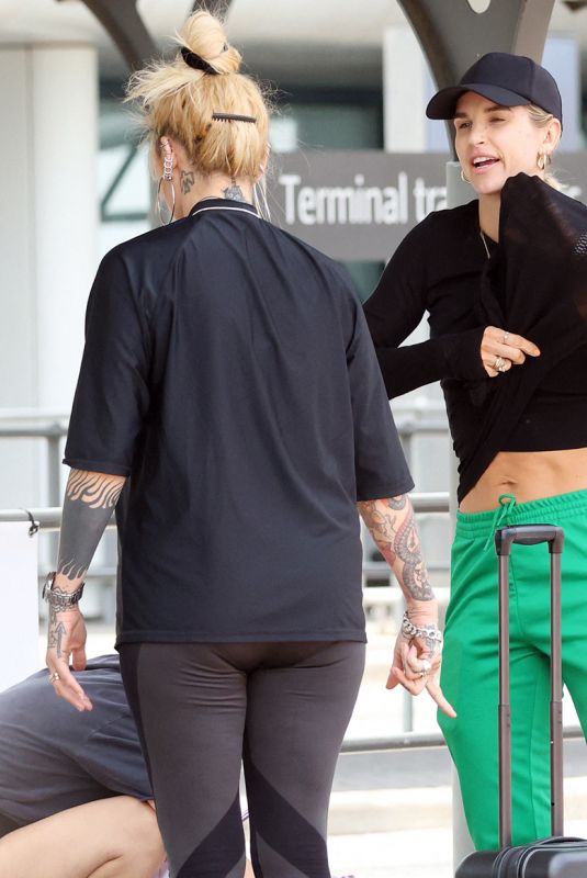 VOGUE WILLIAMS and JOANNE MCNALLY at Perth Airport 11/12/2023