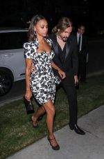 ZOE SALDANA Arrives at Leonardo DiCaprio