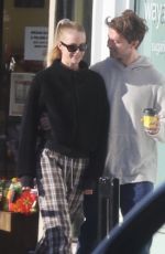 ABBY CHAMPION and Patrick Schwarzenegger Out in Los Angeles 12/23/2023