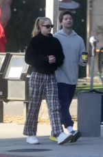 ABBY CHAMPION and Patrick Schwarzenegger Out in Los Angeles 12/23/2023