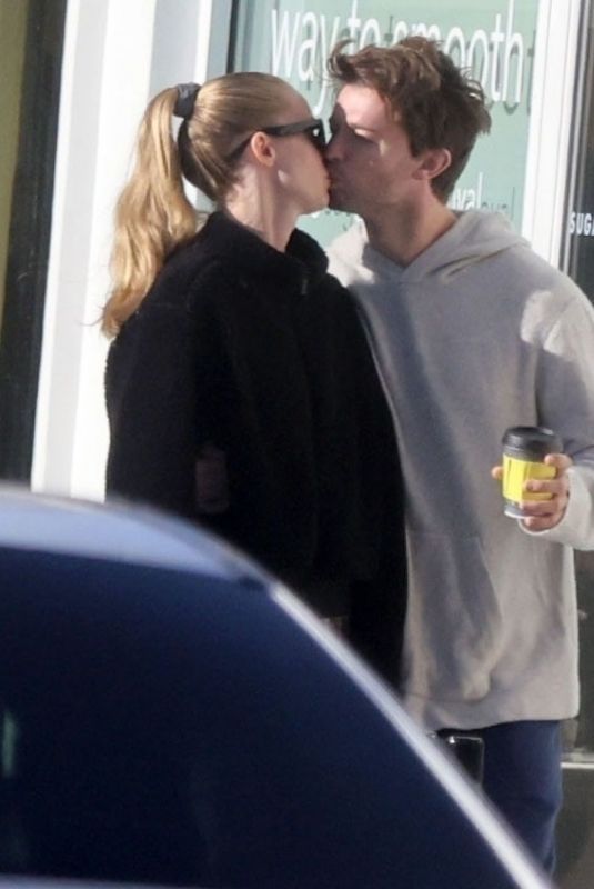 ABBY CHAMPION and Patrick Schwarzenegger Out in Los Angeles 12/23/2023