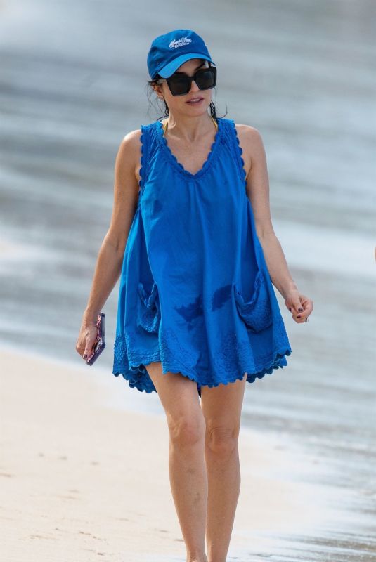 ANDREA CORR on Holiday Break on Sandy Lane Hotel’s Beach in Barbados 12/27/2023