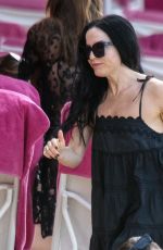 ANDREA CORR Relaxing on the Beach at Sandy Lane Hotel in Barbados 12/28/2023