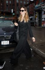 ANGELINA JOLIE Leaves Jean-Michel Basquiat
