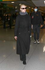ANYA TAYLOR-JOY Arrives at JFK Airport in New York 12/10/2023