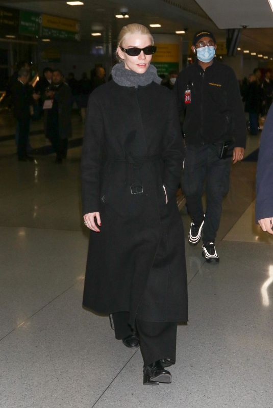 ANYA TAYLOR-JOY Arrives at JFK Airport in New York 12/10/2023