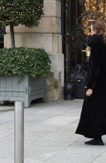ASHLEY and MARY KATE OLSEN Out in Paris 12/18/2023