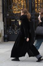 ASHLEY and MARY KATE OLSEN Out in Paris 12/18/2023