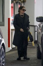 ASHLEY BANSON and Brandon Davis at a Valet Parking at E Baldi in Los Angeles 12/21/2023