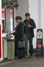 ASHLEY BANSON and Brandon Davis at a Valet Parking at E Baldi in Los Angeles 12/21/2023