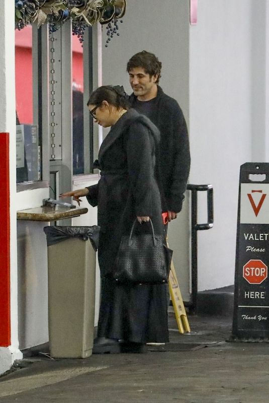 ASHLEY BANSON and Brandon Davis at a Valet Parking at E Baldi in Los Angeles 12/21/2023