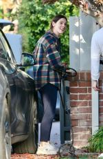 ASHLEY GREENE Arrives at a Friend