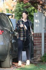 ASHLEY GREENE Arrives at a Friend