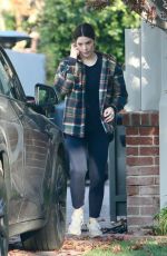 ASHLEY GREENE Arrives at a Friend
