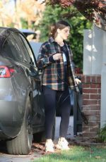 ASHLEY GREENE Arrives at a Friend