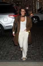 BELLA HADID Arrives at Her Sister Gigi