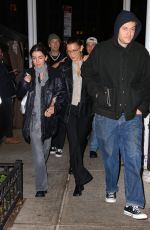 BELLA HADID Leaves Zero Bond with Friends in New York 12/21/2023