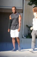 BRIGID COULTER and Don Cheadle Out for Morning Walk in Los Angeles 12/16/2023