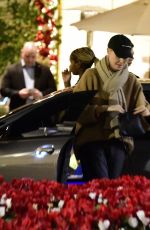 CHARLIZE THERON Shopping at Grove Mall with Jackson in Los Angeles 12/18/2023