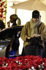 CHARLIZE THERON Shopping at Grove Mall with Jackson in Los Angeles 12/18/2023