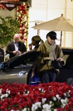 CHARLIZE THERON Shopping at Grove Mall with Jackson in Los Angeles 12/18/2023