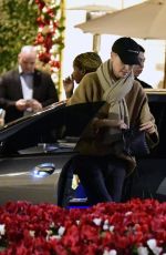 CHARLIZE THERON Shopping at Grove Mall with Jackson in Los Angeles 12/18/2023