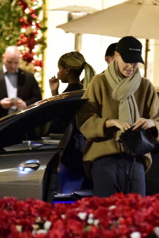 CHARLIZE THERON Shopping at Grove Mall with Jackson in Los Angeles 12/18/2023