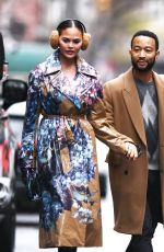 CHRISSY TEIGEN and John Legend Arrives at Rockefeller Center in New York 12/27/2023