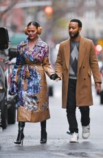 CHRISSY TEIGEN and John Legend Arrives at Rockefeller Center in New York 12/27/2023
