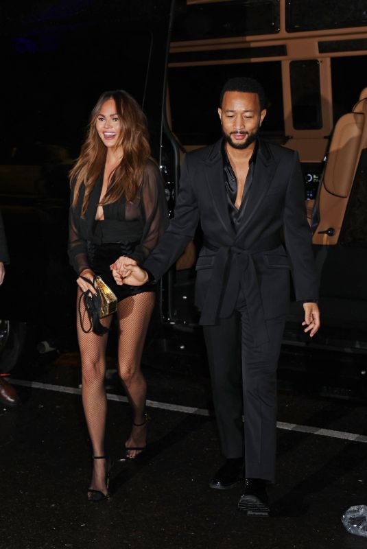 CHRISSY TEIGEN and John Legend Arrives at The Polo Bar in New York 12/28/2023