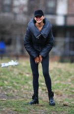 CHRISSY TEIGEN at Washington Square Park in New York 12/28/2023