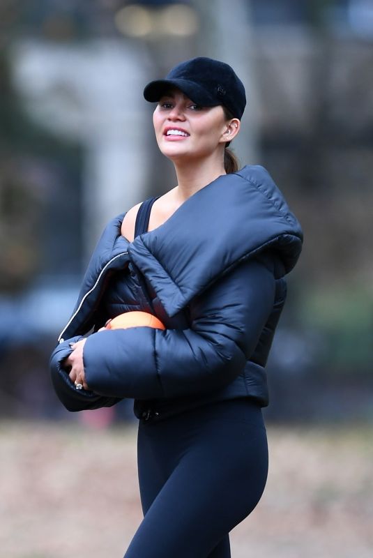 CHRISSY TEIGEN at Washington Square Park in New York 12/28/2023