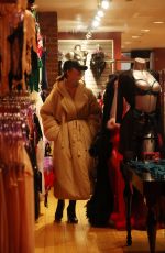 CHRISSY TEIGEN Out Shopping with Friends at Hustlers in New York 12/28/2023