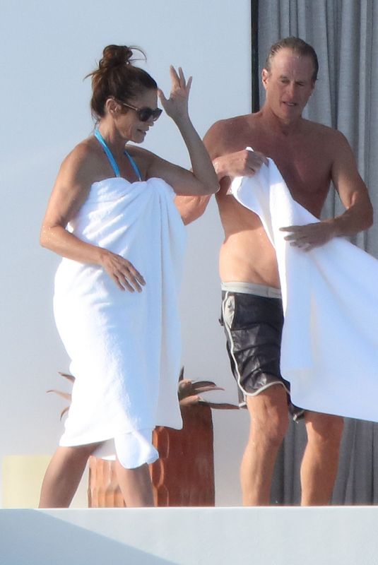 CINDY CRAWFORD and Rande Gerber on Vacation in Los Cabos 12/29/2023