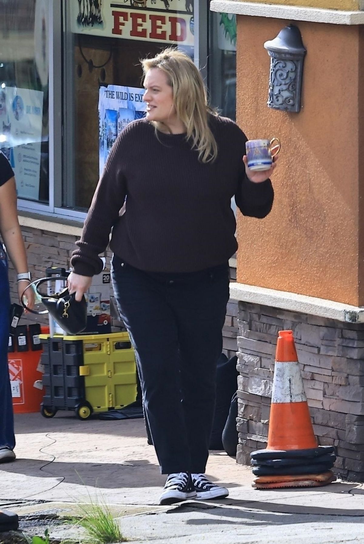 ELISABETH MOSS Continuing Her Filming Endeavors in Los Angeles 12/26 ...