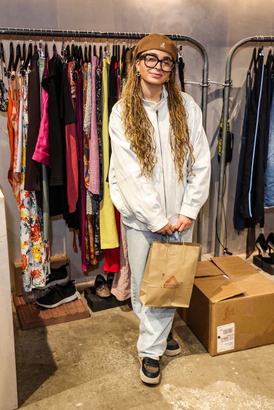 ELLA EYRE Donating to Shelter’s Boutique in Kings Cross in London 12/19/2023